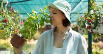 portrait-female-farmer-working-her-greenhouse