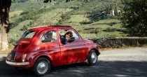 medium-shot-woman-red-car