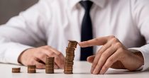 front-view-businessman-suit-tie-with-coins